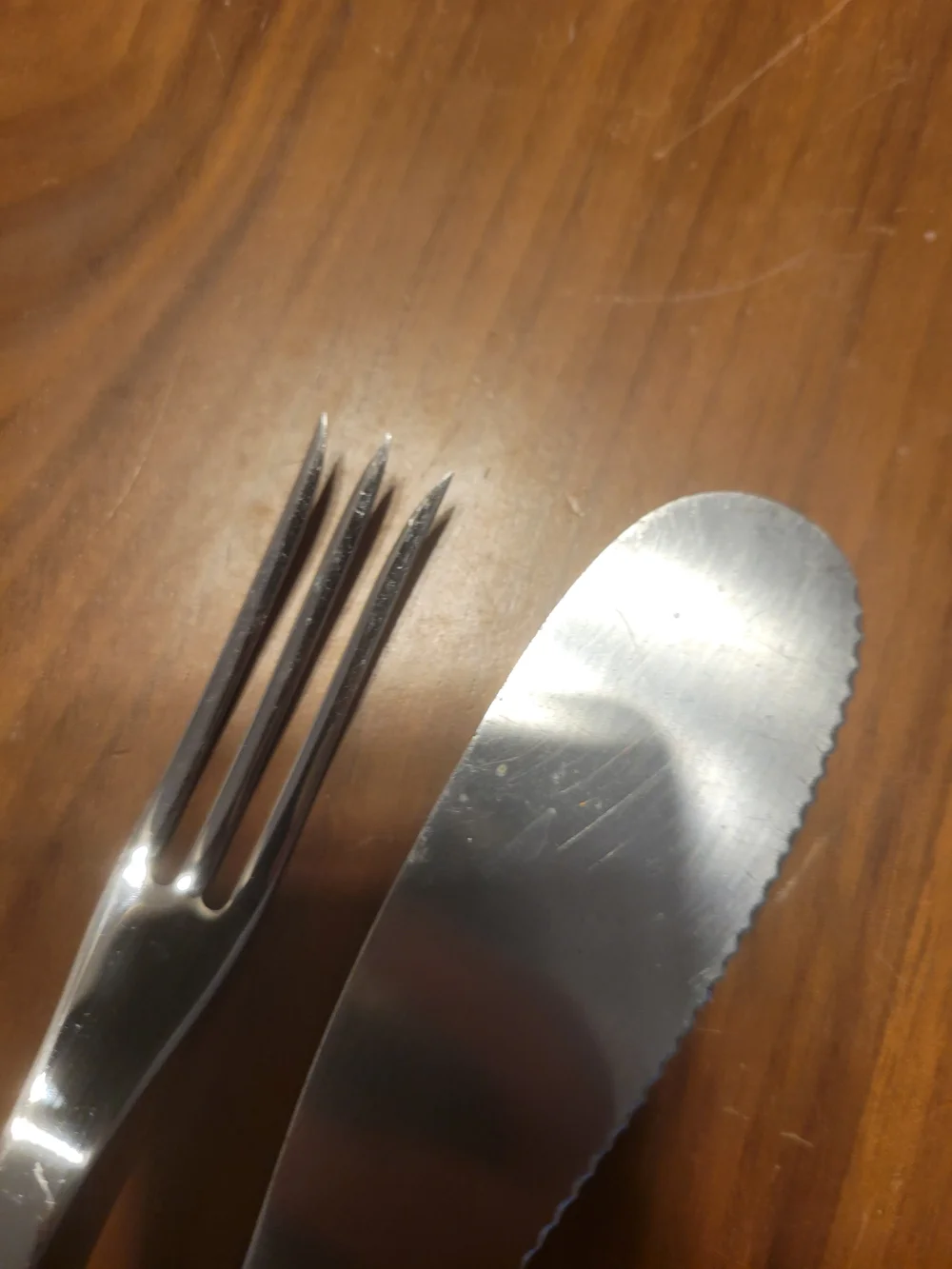 Cutco Stainless Steel Spreader and Fork Set with Dark Brown Handles